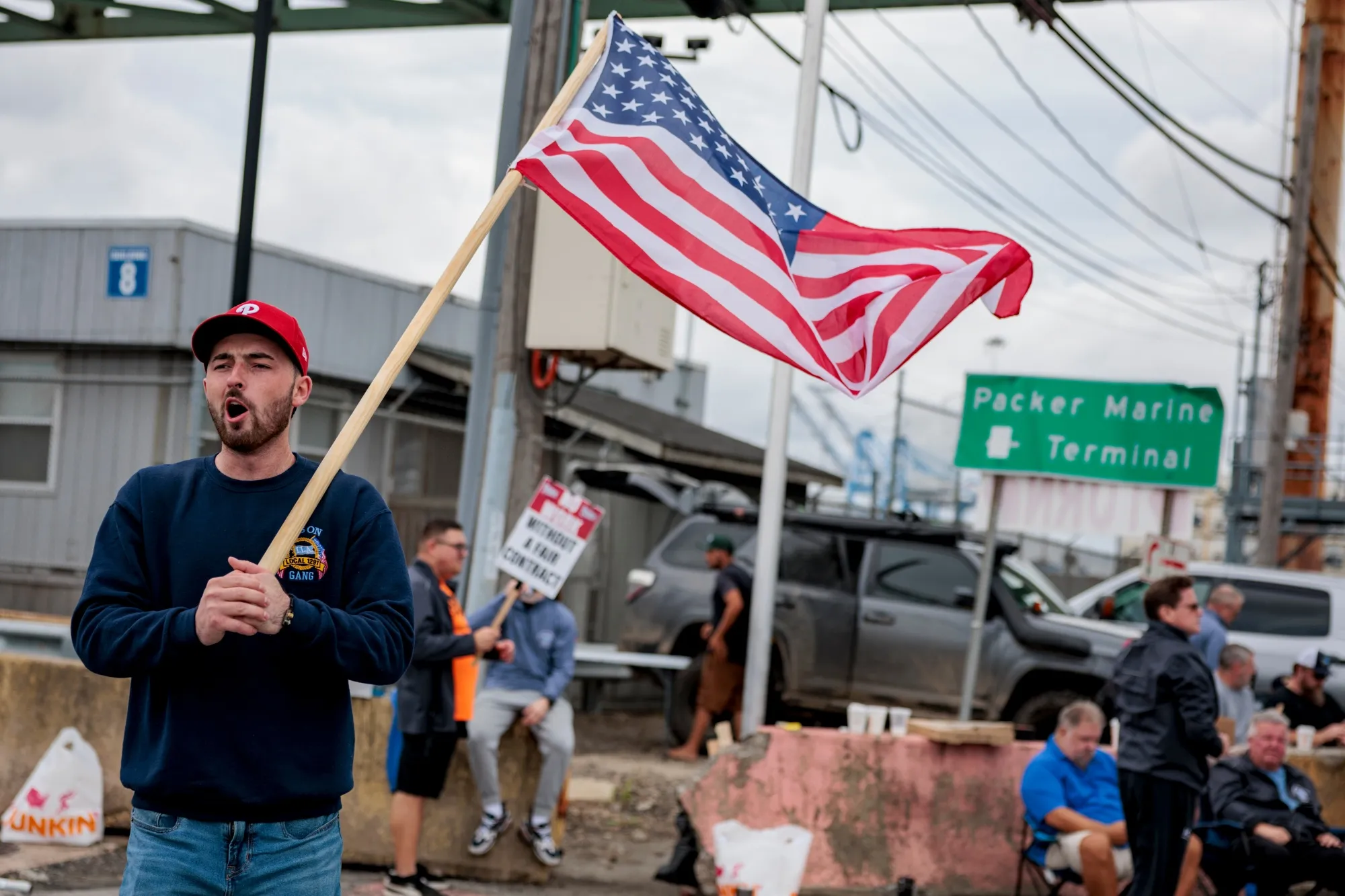 Workers picket outside the Port of Philadelphia on Oct. 1.