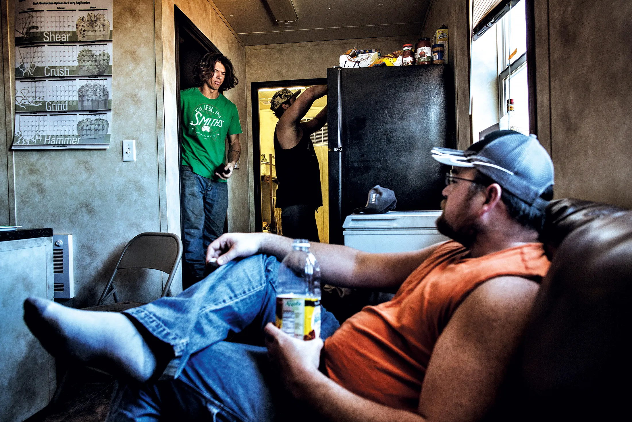 Roughnecks in a man camp before their shift outside Watford City, N.D.
