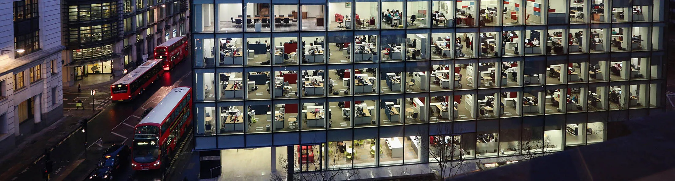 Workers In Offices At Night In London