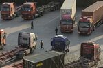 Trucks parked at the Yangshan Deepwater Port in Shanghai, China.