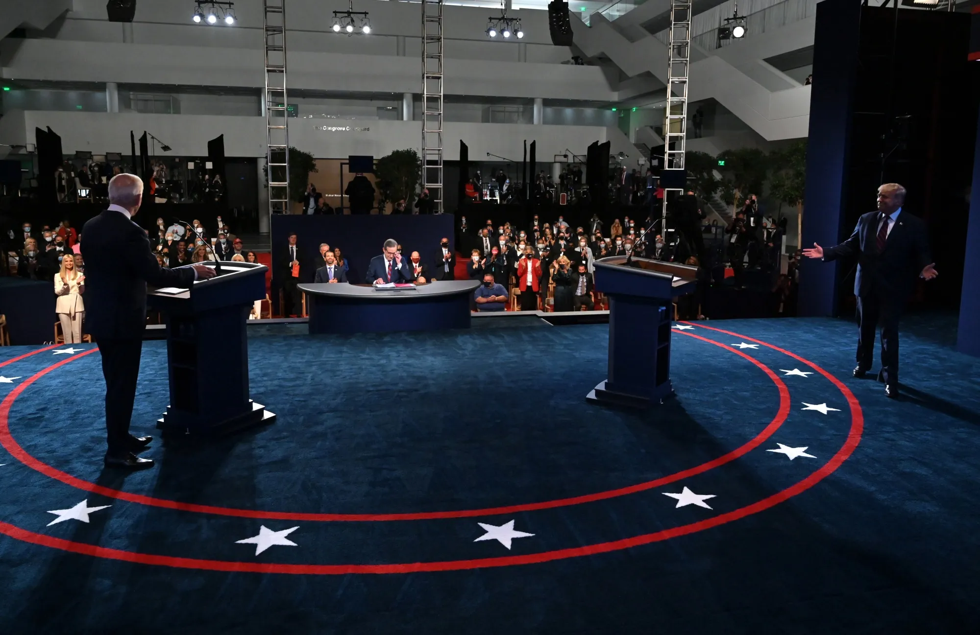Donald Trump, right, arrives to the first U.S. presidential debate with Joe Biden, left, in Cleveland, Ohio on Sept. 29.