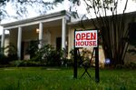 An &quot;Open House&quot; sign is displayed outside of a home for sale in Miami, Florida, U.S., on Saturday, Nov. 19, 2016.