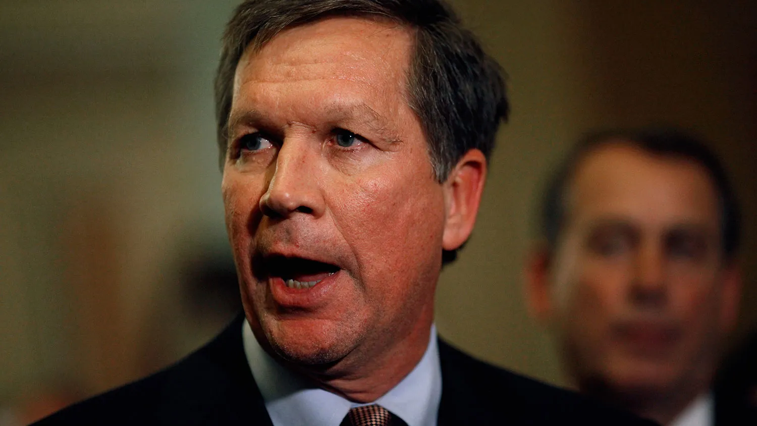 Ohio Governor-elect John Kasich talks with reporters after meeting with House and Senate Republican leaders and fellow governors-elect at the U.S. Capitol December 1, 2010 in Washington, DC.
