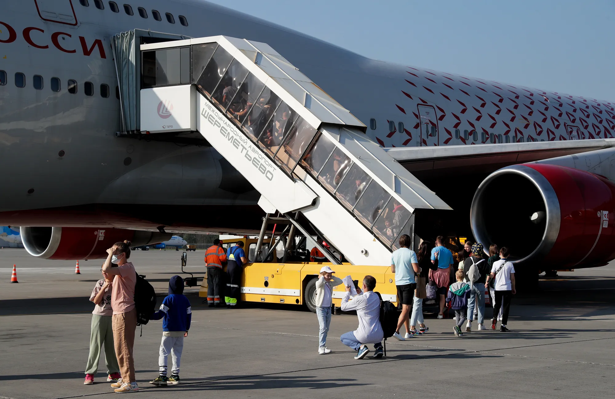 Passengers board a Rossiya flight bound for Sharm El-Sheikh, Egypt at Sheremetyevo International Airport, in Moscow on Aug. 9.&nbsp;