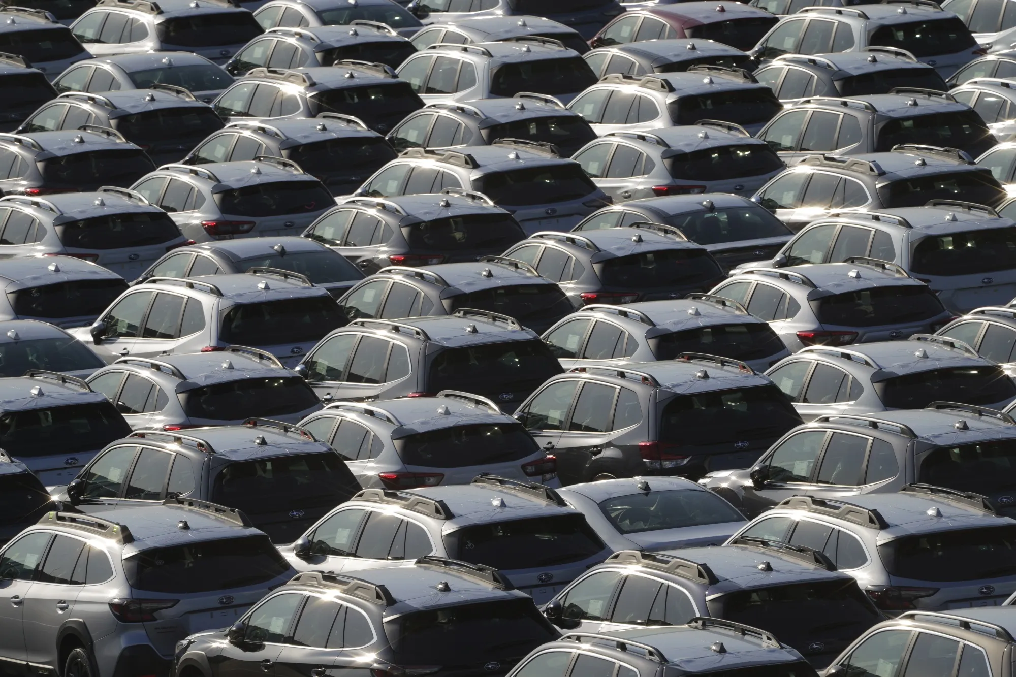 Vehicles bound for shipment at a port in Yokohama, Japan.