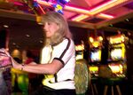 A woman plays the slot machines at Harrah's Casino in Tunica in 2002. The casino closed down in 2014. 