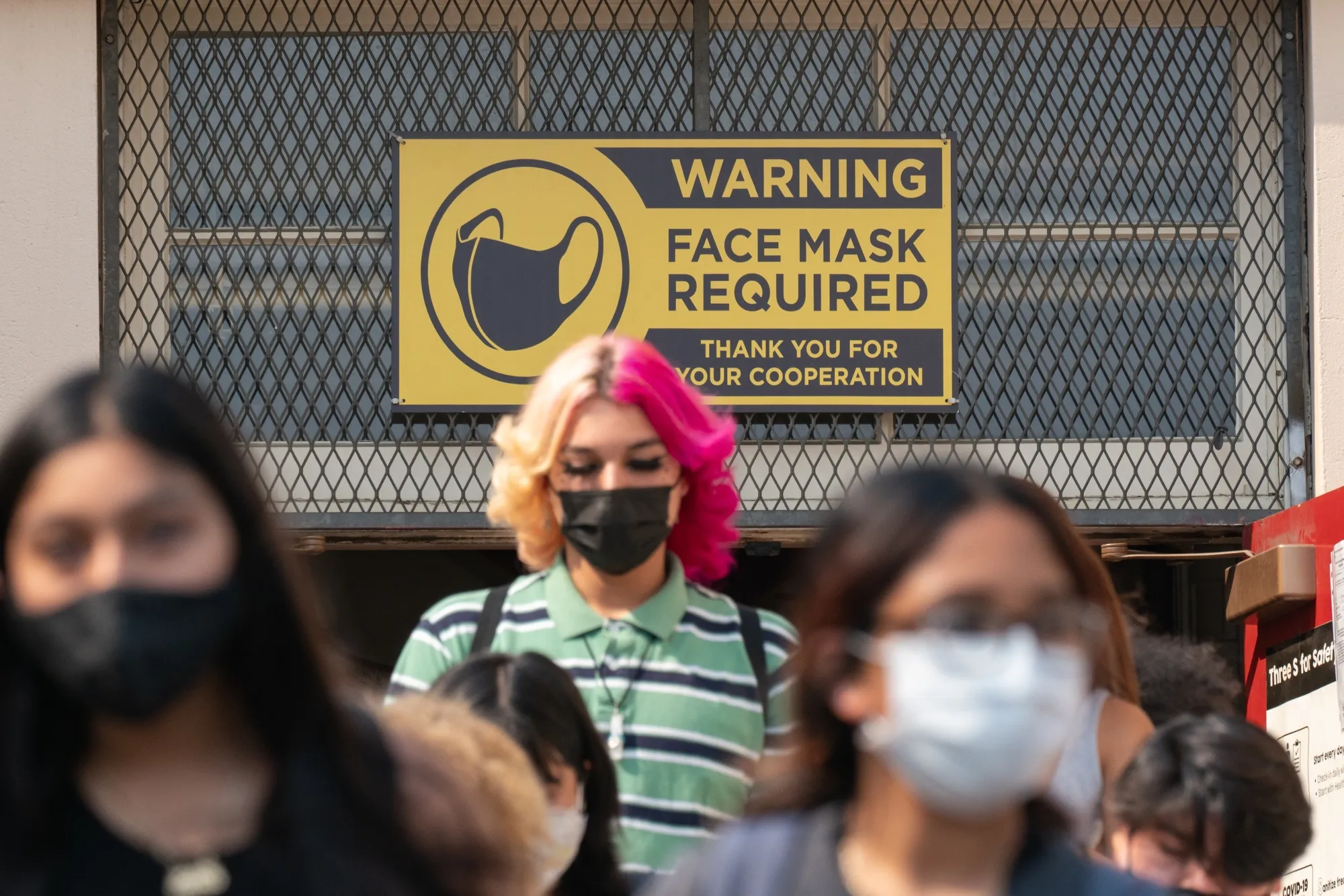 Students exit Hollywood High School&nbsp;in Los Angeles, California.
