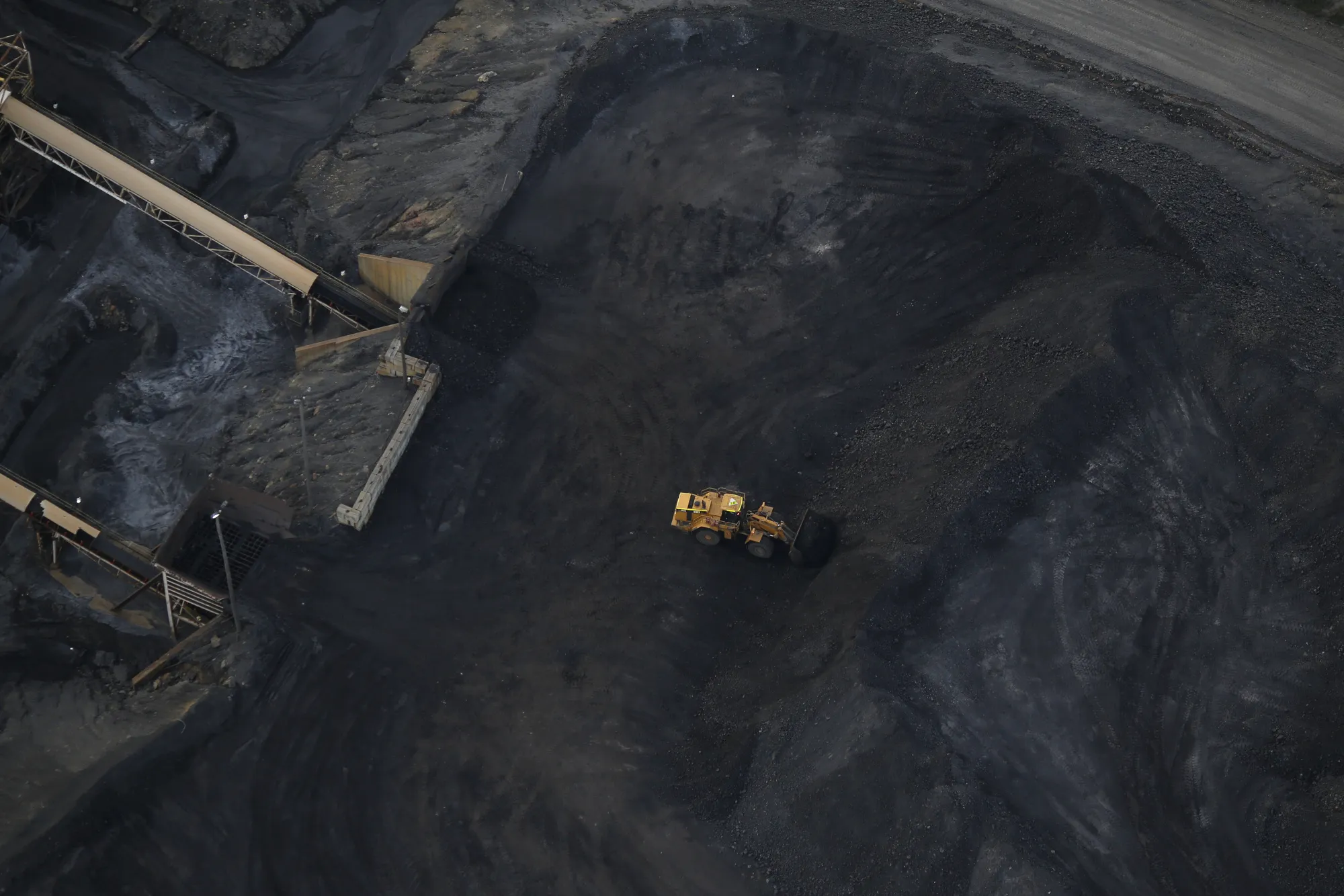 A front loader moves coal at a surface mine in Oakland City, Indiana.