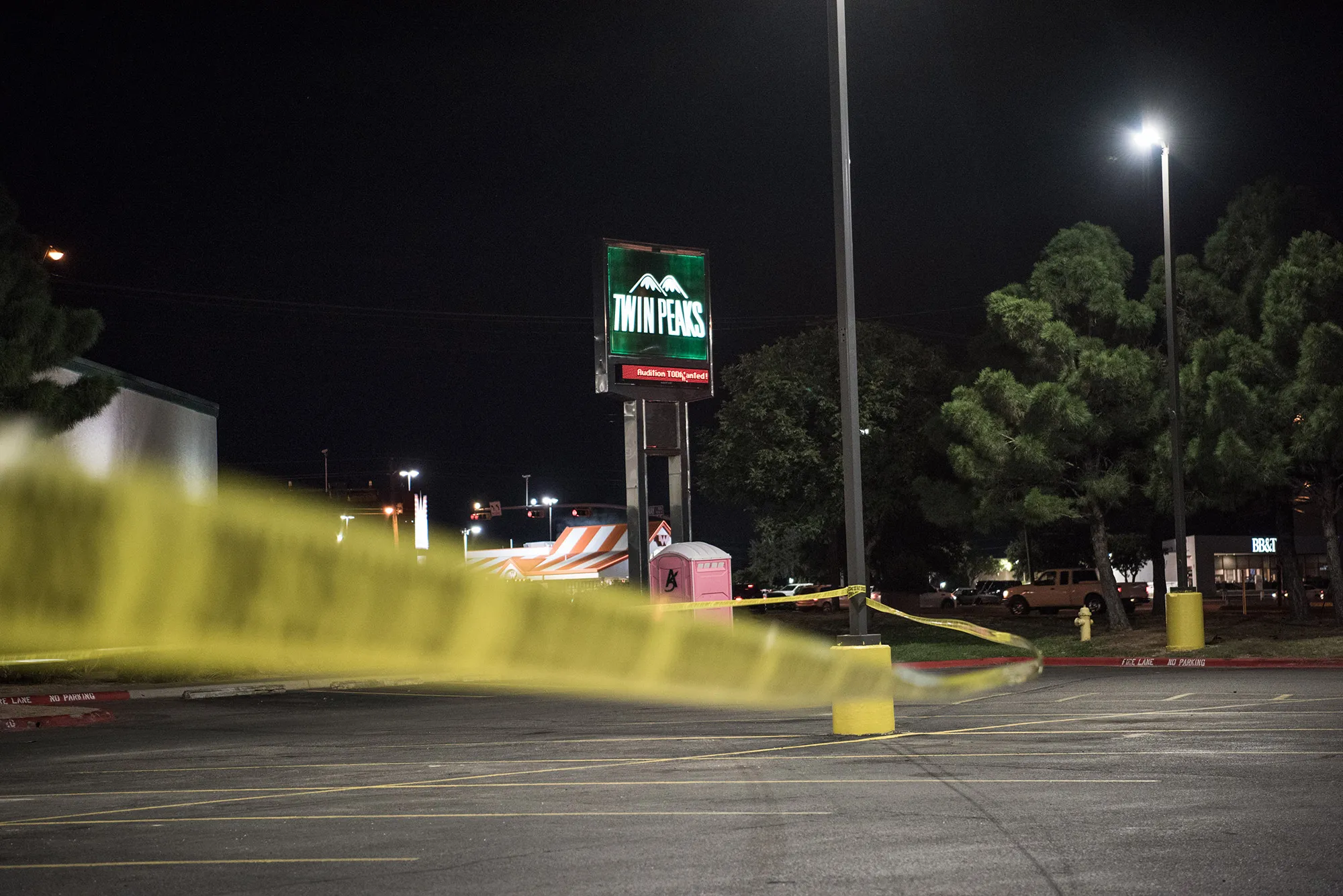 Police tape marks the scene outside a Twin Peaks restaurant&nbsp;on Aug.&nbsp;31.&nbsp;