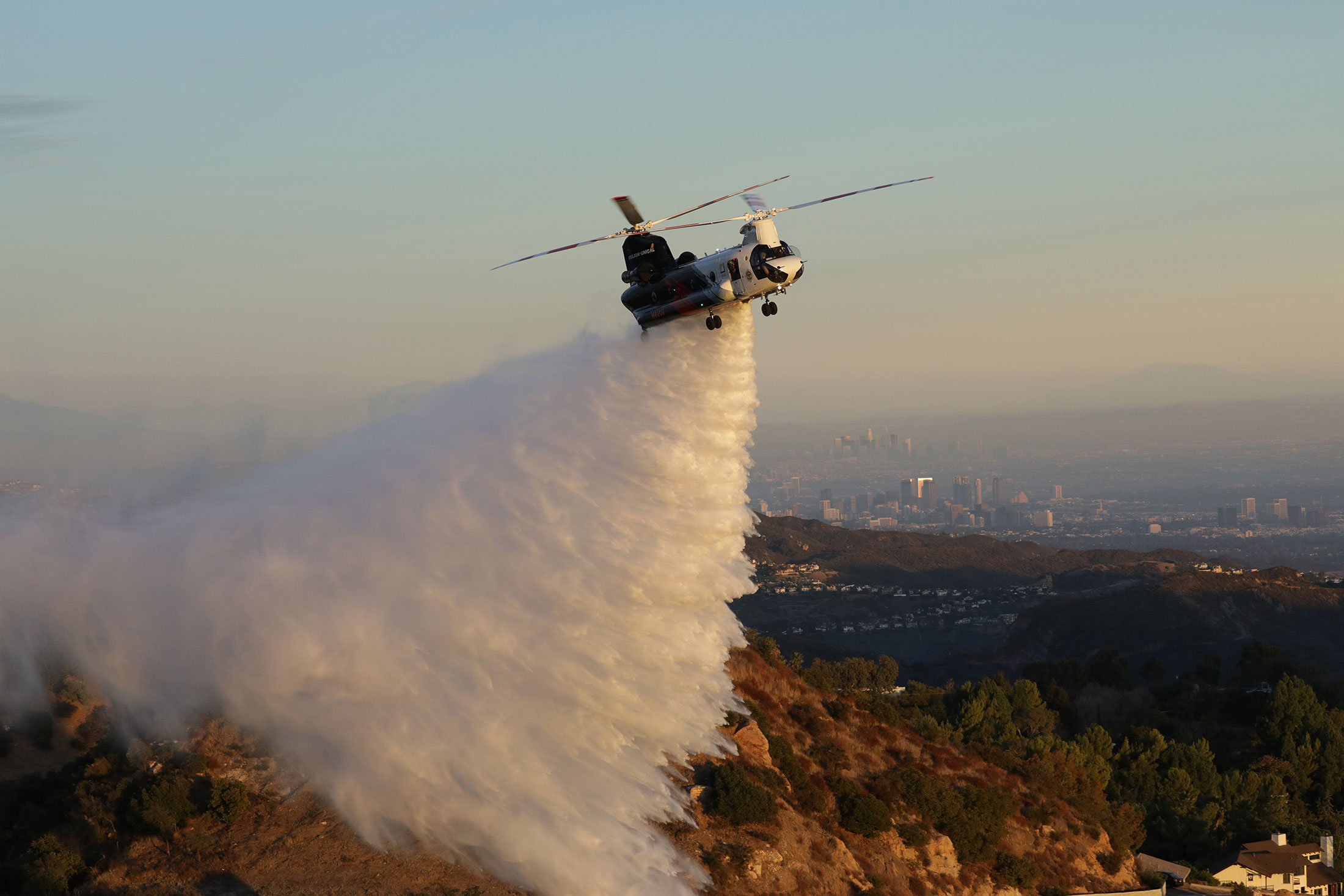 Image of Forest fire with a helicopter