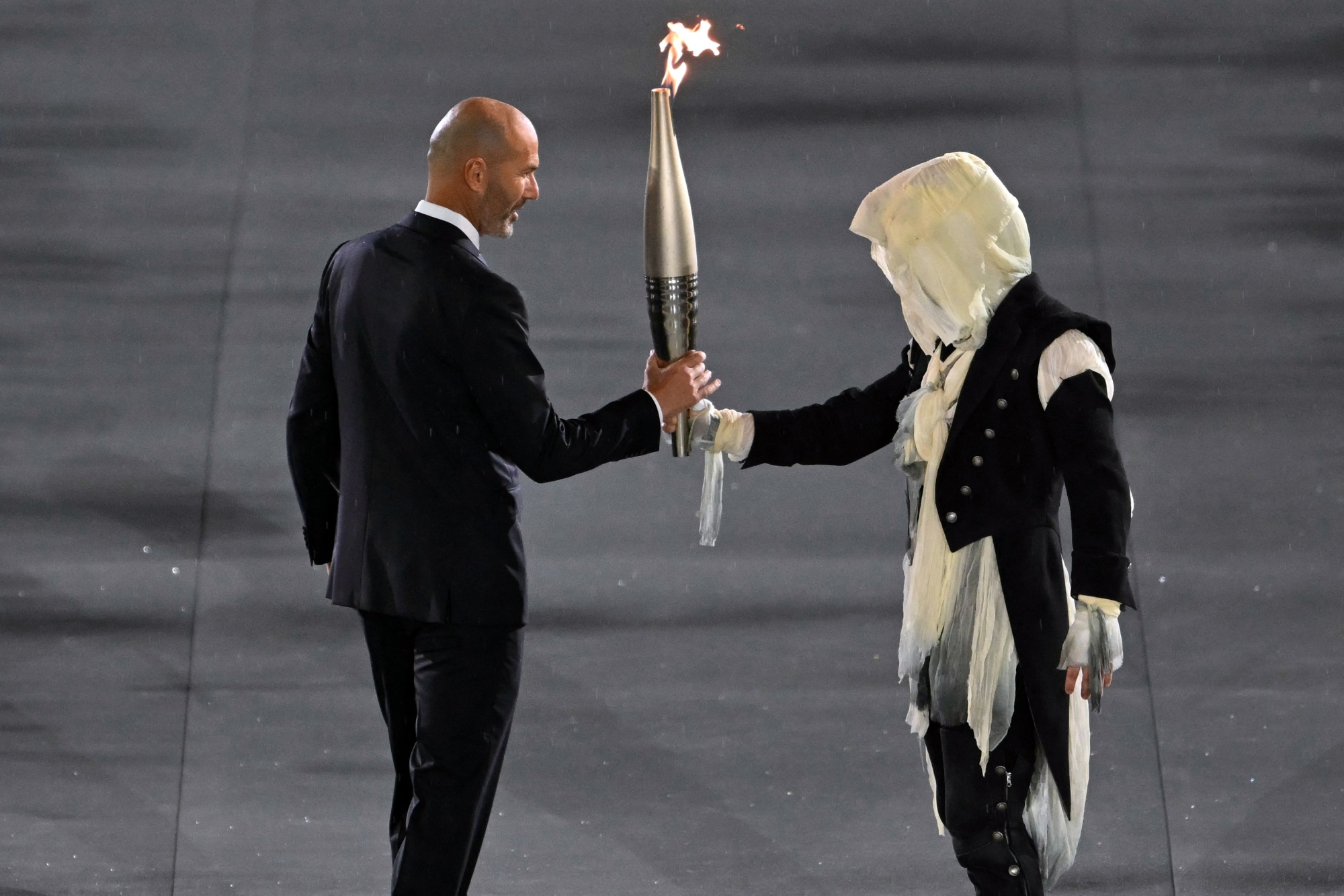 Olympics opening ceremony moments: Céline Dion, Lady Gaga, curious  torchbearer and French musicians - Bloomberg