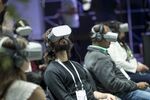Attendees use Oculus VR Inc. headsets during the F8 Developers Conference in San Jose, California in 2019.