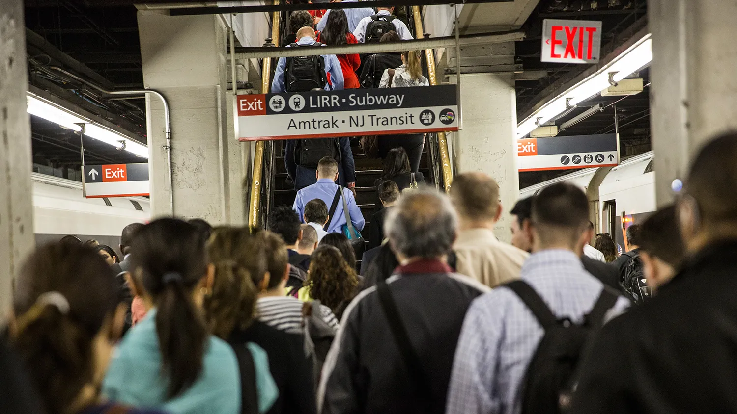 People arrive at New York Penn Station from a NJ Transit train on May 13, 2015 in New York City.
