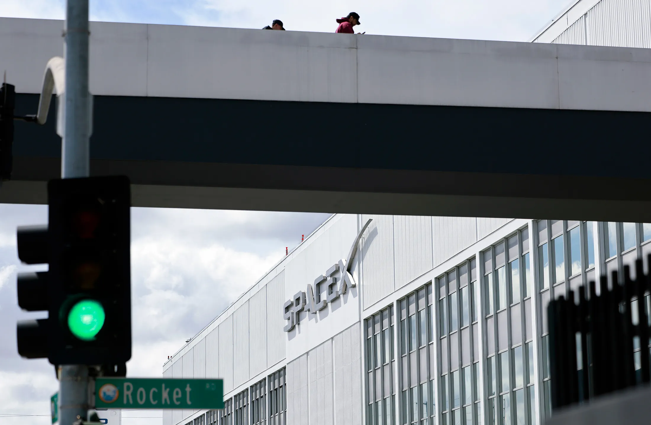 HAWTHORNE, CALIFORNIA - APRIL 02: The SpaceX logo is displayed at a SpaceX facility on April 2, 2026 in Hawthorne, California. Elon Musk’s rocket and satellite company SpaceX has confidentially filed for an initial public offering (IPO) in what may be one of the largest public offerings in history.
