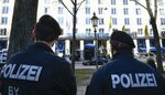 Police officers stand in front of the Hotel Bayerischer Hof venue for the Munich Security Conference (MSC) in Munich.