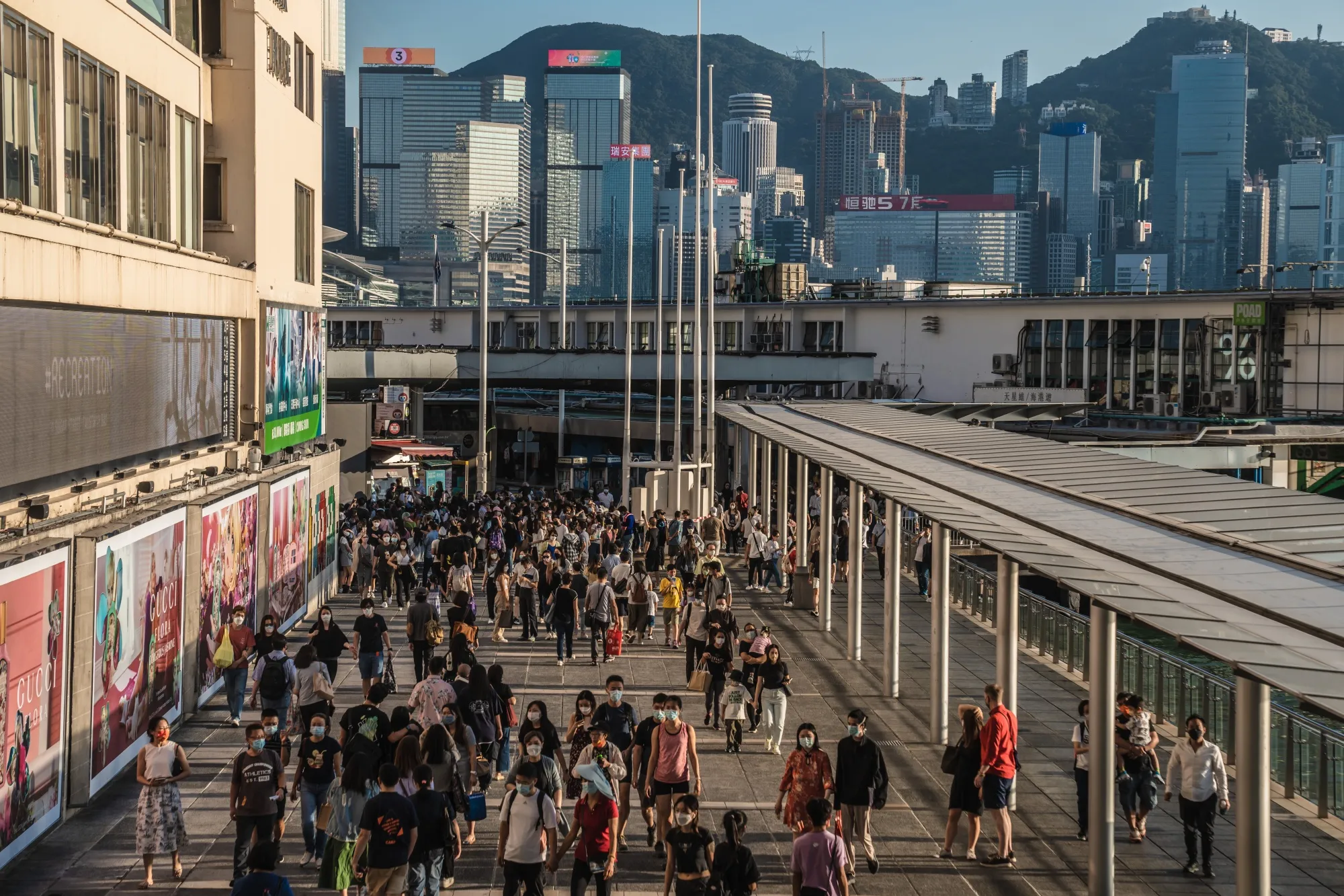 Pedestrians outside Harbour City shopping mall in Hong Kong.