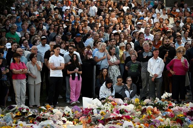 Mourners near the scene of the shooting at Bondi Beach in Sydney on Dec. 15.