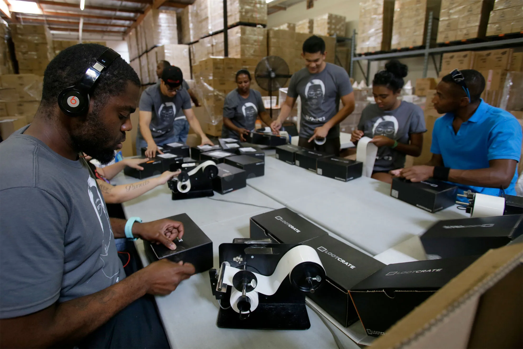 Workers prepare boxes at Loot Crate in Los Angeles in 2014.
