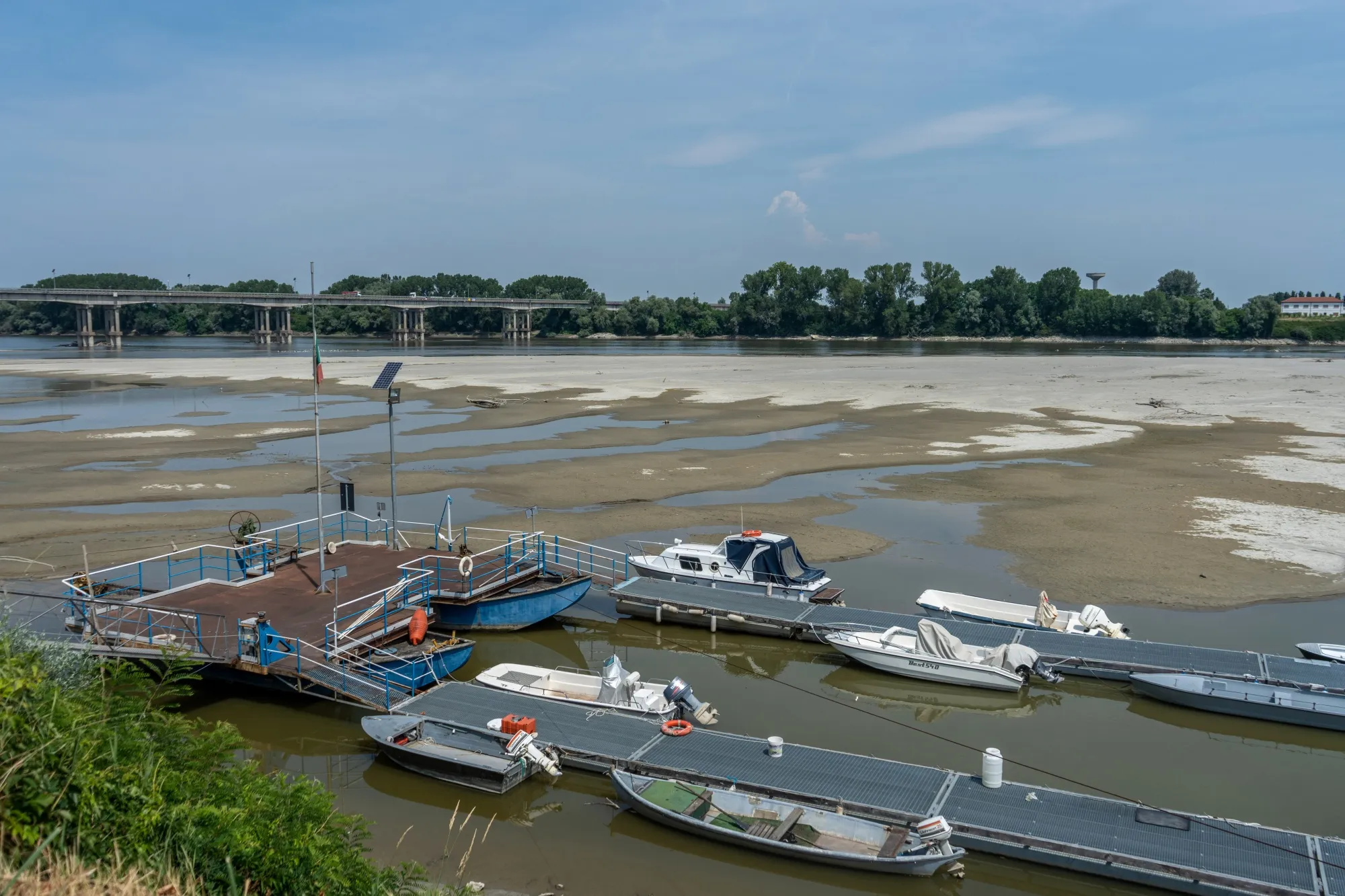Boats on the exposed bed of the Po in Calto, Italy, on&nbsp;June 17.