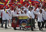 Celebrating Chavismo, high inflation and a shortage of food. Photographer: John Moore/Getty Images