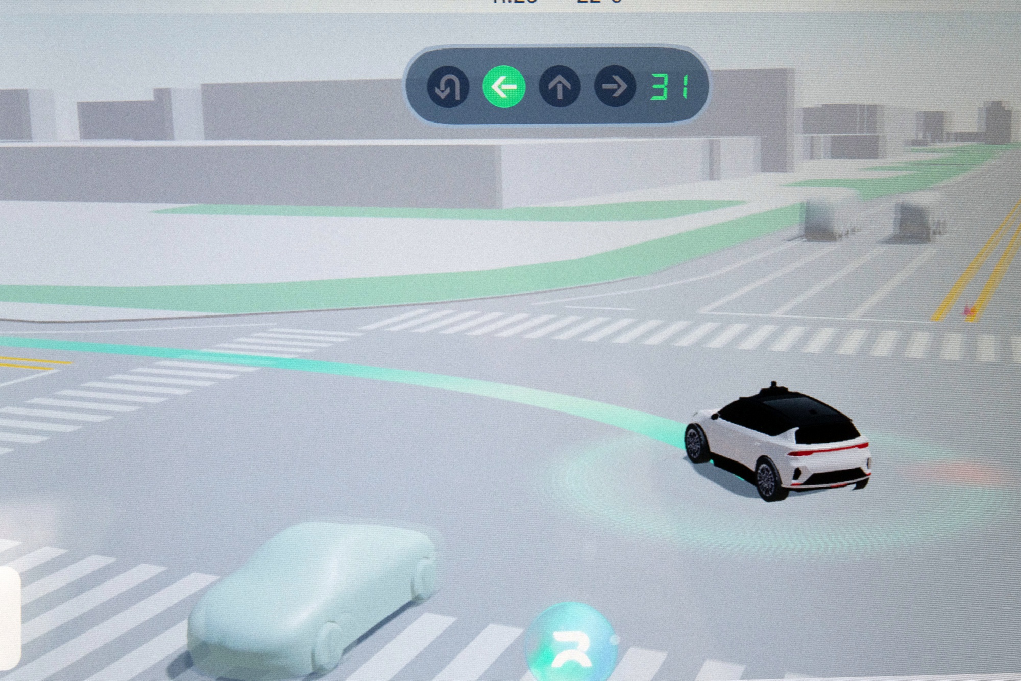 A screen showing the travel path through an intersection onboard a robotaxi equipped with Baidu's autonomous driving platform Apollo in Beijing&nbsp;on Nov. 10.&nbsp;