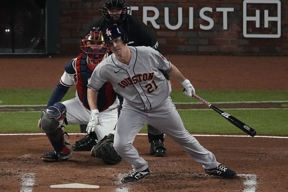 Houston, United States. 16th Oct, 2021. Houston Astros Kyle Tucker and  Carlos Correa celebrate after they both scored on a single by teammate Yuli  Gurriel in the 4th inning in game two