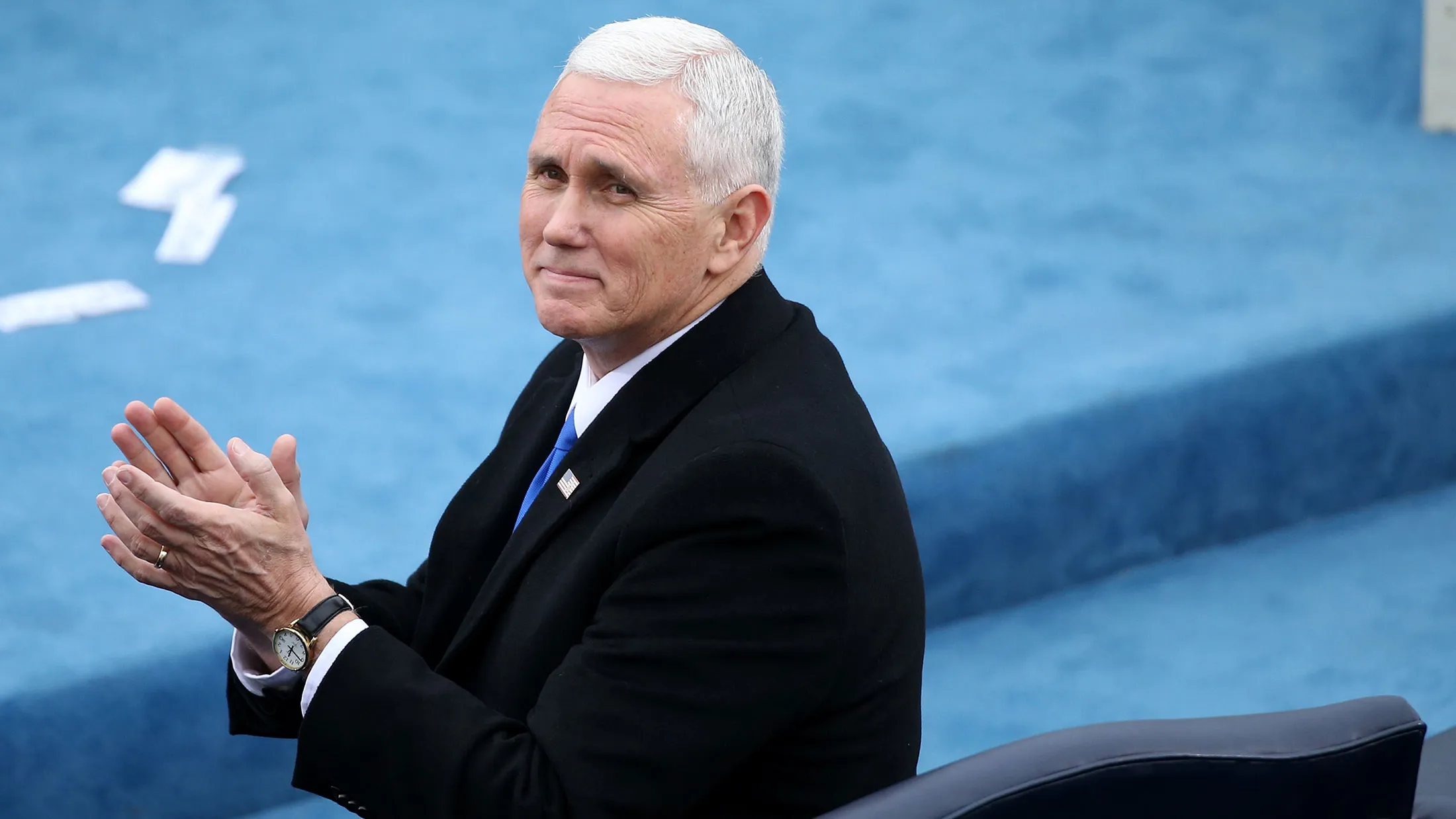 Vice President Mike Pence applauds during the inauguration in Washington on Jan. 20, 2017.
