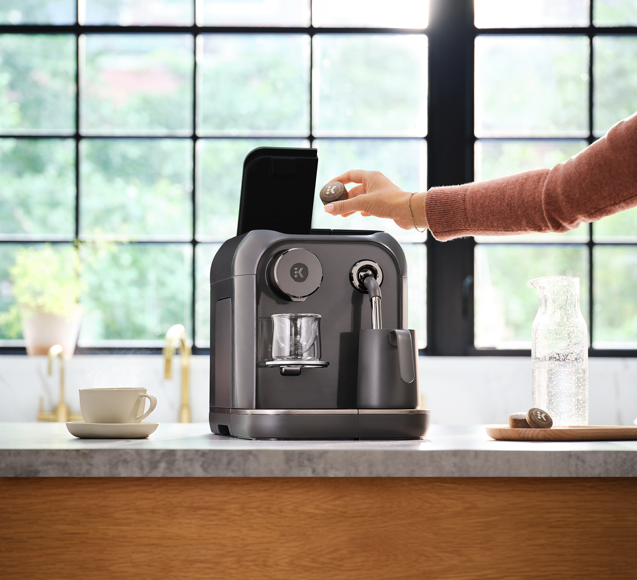 Keurig Alta coffee maker with AltaRounds, compressed coffee pucks. Keurig