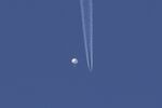 A large balloon drifts above the Kingston, North Carolina, on Feb. 4, 2023.
