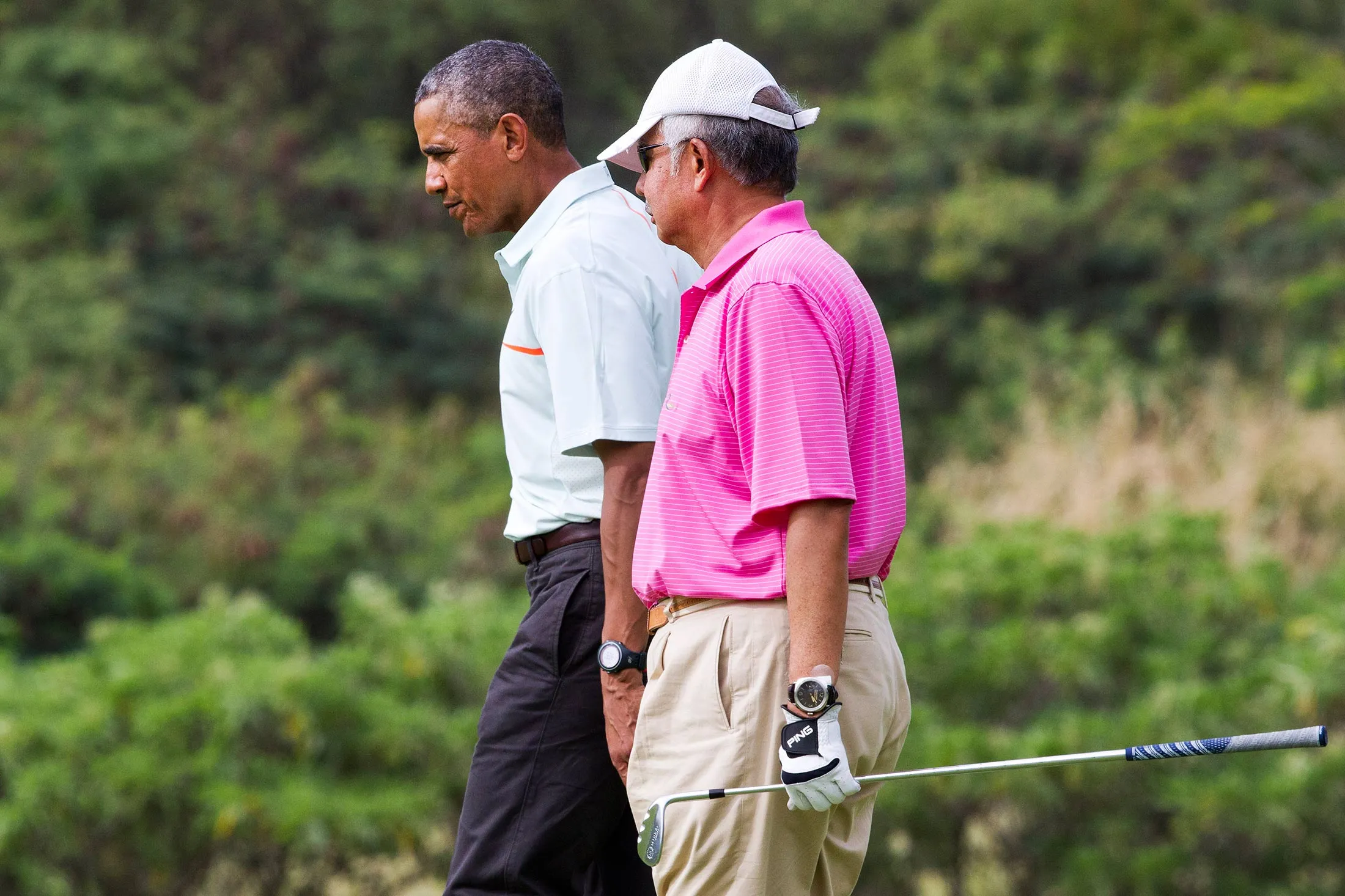 President Barack Obama plays golf with Malaysian Prime Minister Najib Razak, on Dec. 24, 2014, in Kaneohe, Hawaii.

