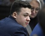Kyle Rittenhouse listens as the attorneys and the judge talk about jury instructions at the Kenosha County Courthouse on Nov. 15.