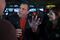 Chris Christie, governor of New Jersey and 2016 Republican presidential candidate, center, talks to Steve Bookbinder, left, during a campaign stop with his wife Mary Pat Christie at Billy's Sports Bar in Manchester, New Hampshire, U.S., on Sunday, Dec. 20, 2015. In a grim, gloomy Republican presidential debate last Tuesday dominated by the terrorist attacks in Paris and San Bernardino, California, the candidates tried to one-up each other on who is tougher. Photographer: Andrew Harrer/Bloomberg *** Local Caption *** Chris Christie; Steve Bookbinder; Mary Pat Christie