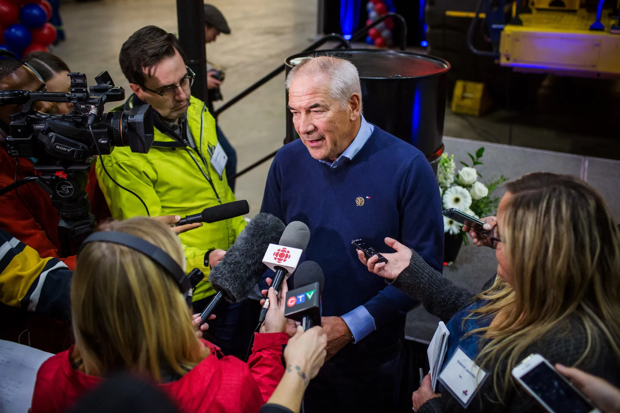 Suncor CEO Steve Williams speaks to reporters near Fort McKay, Alberta.