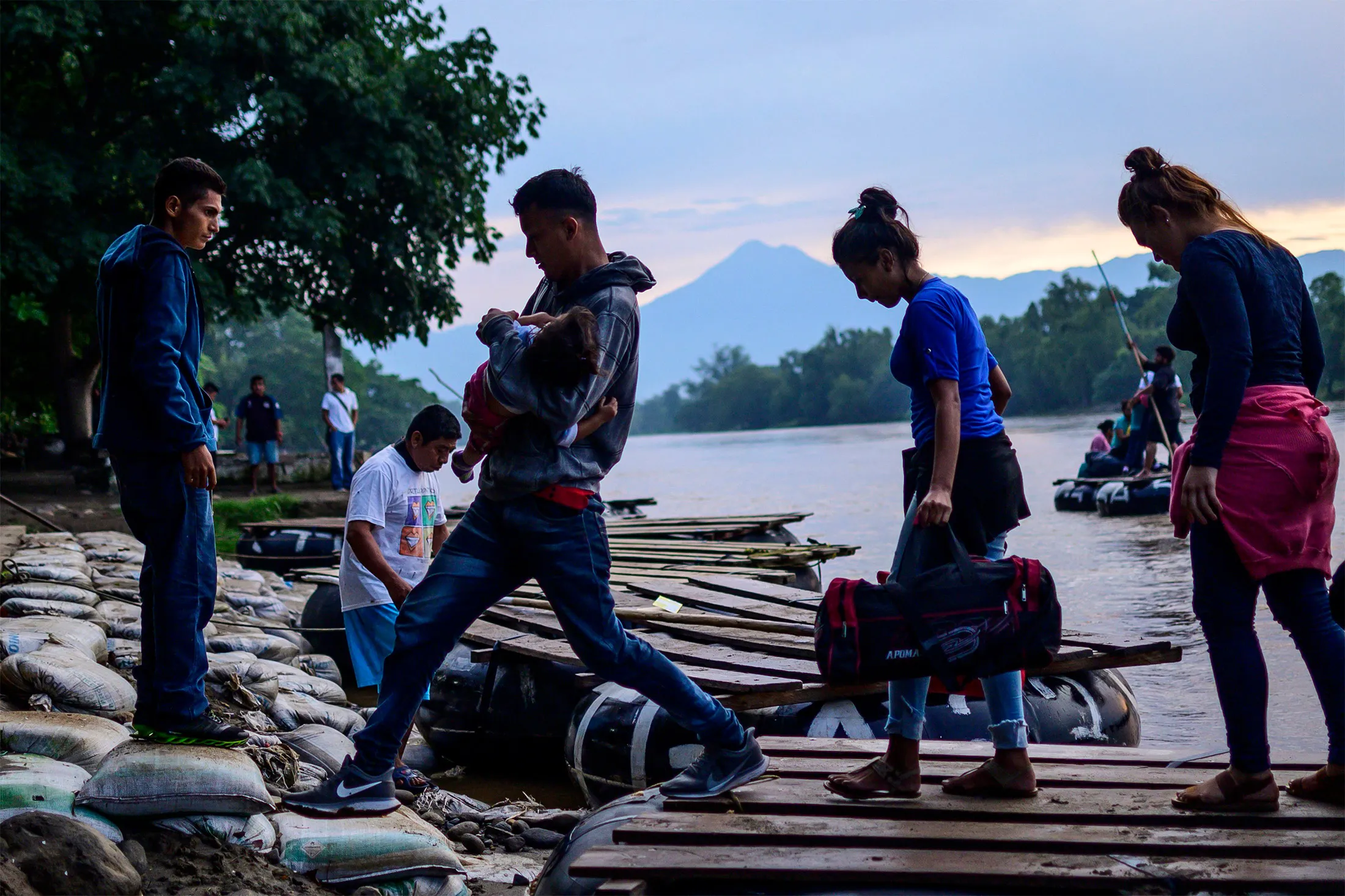 Central American migrants arrive in Ciudad Hidalgo in Chiapas State, Mexico, after illegally crossing the Suchiate river from Tecun Uman in Guatemala on a makeshift raft.&nbsp;