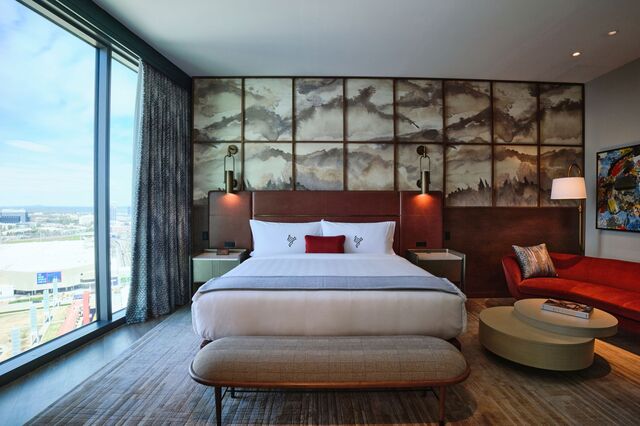 A bedroom in a penthouse room at Hotel Phoenix. 