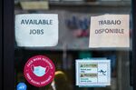 A sign reads in English and Spanish "Jobs Available" outside an employment agency in Perth Amboy, New Jersey, U.S., on Tuesday, March 30, 2021. 