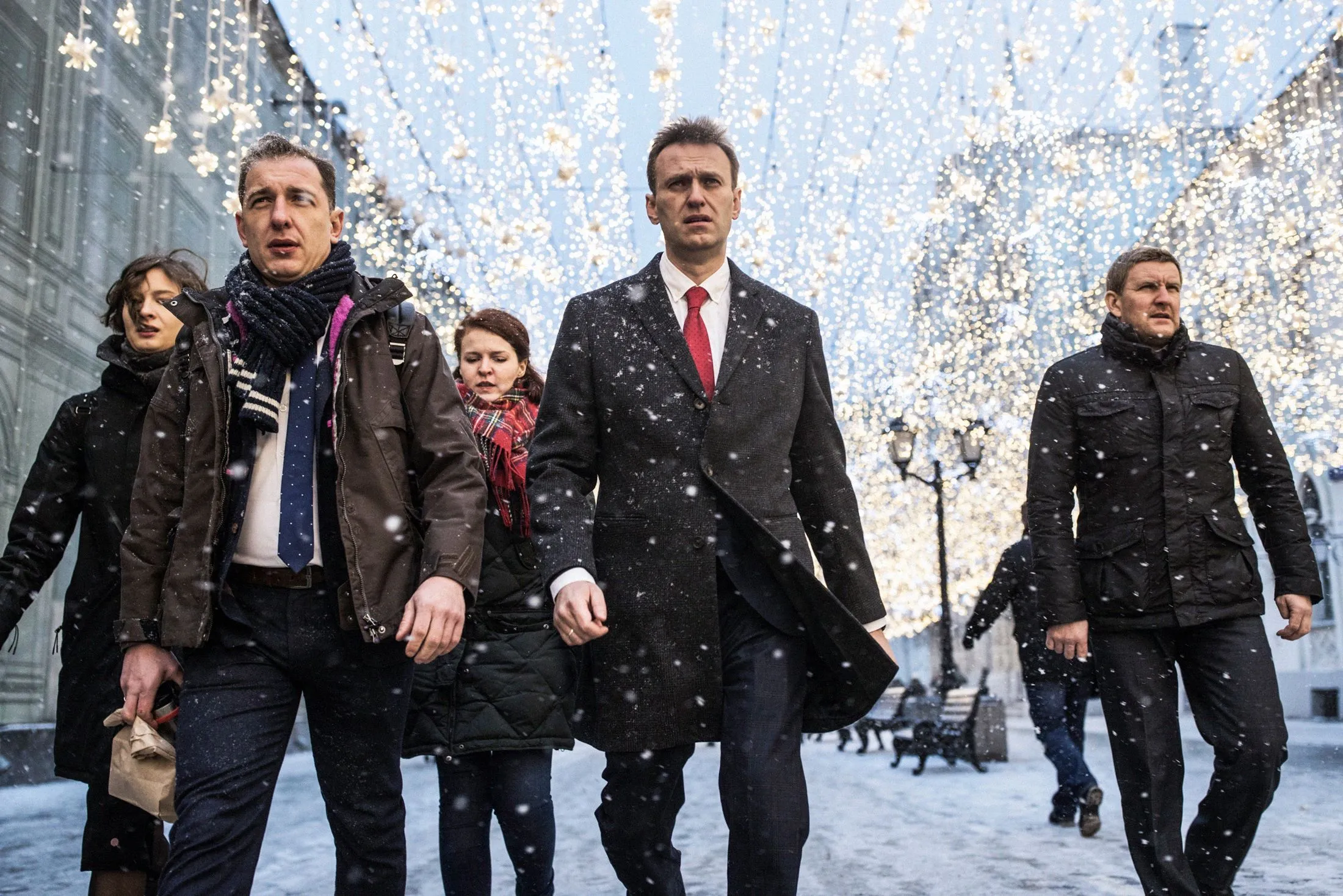 Russian opposition leader Alexei Navalny, who submitted endorsement papers necessary for his registration as a presidential candidate, center, heads to attend a meeting in the Russia's Central Election commission in Moscow on&nbsp;Monday, Dec. 25, 2017. Russian election officials have formally barred Navalny from running for president.&nbsp;