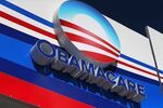 An Obamacare sign is seen on the UniVista Insurance company office on Dec. 15, 2015, in Miami.
