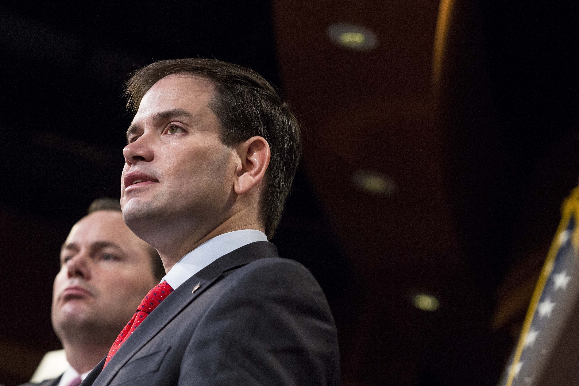 WASHINGTON, DC - MARCH 4, 2015: Senators Marco Rubio (R-FL) and Mike Lee (R-Utah) during a news conference to introduce their proposal for an overhaul of the tax code, on Capitol Hill in Washington, March 4, 2015. One part of their plan proposes to reduce seven tax brackets for income tax to two: 15 percent and 35 percent.
