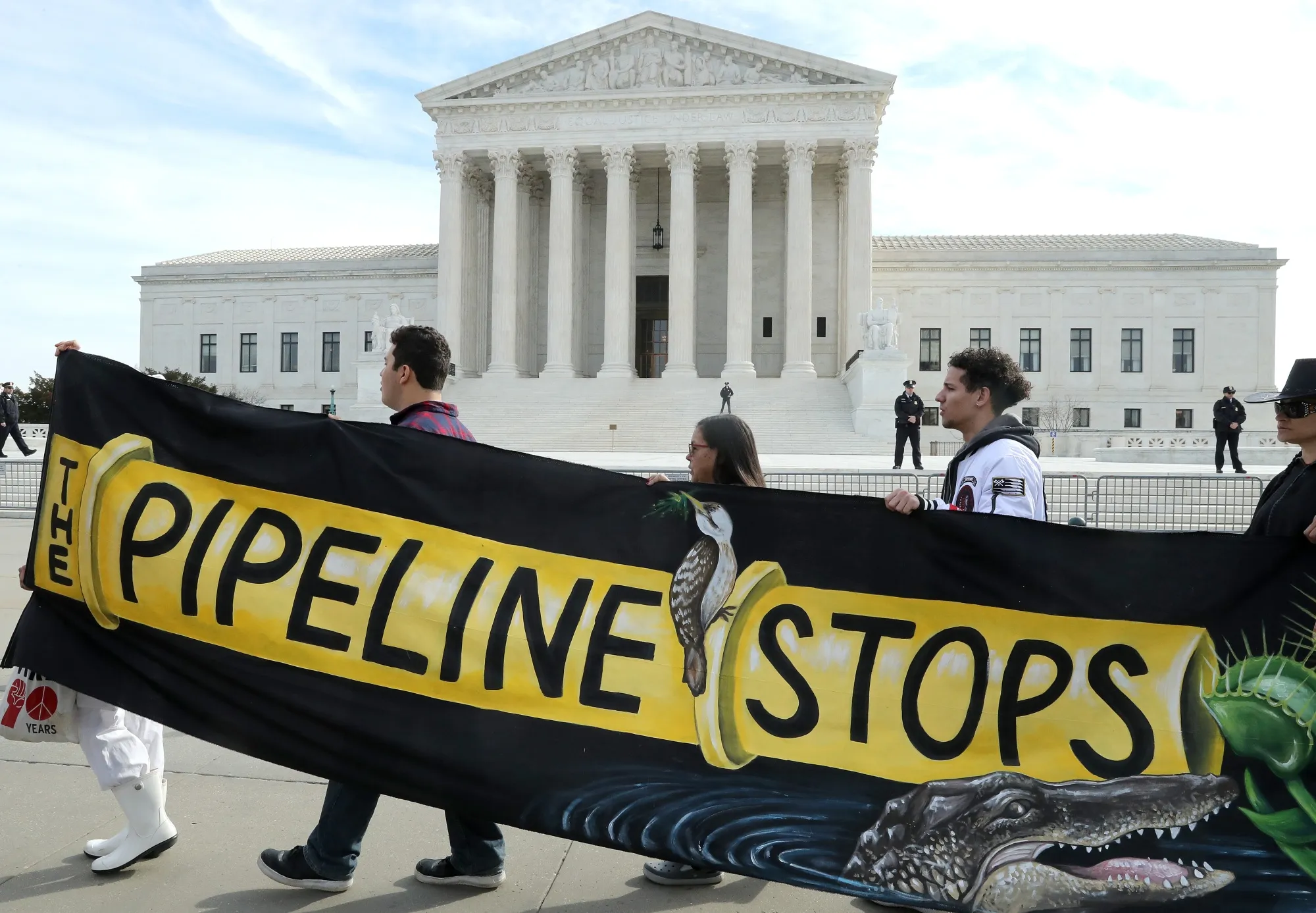 Climate activist groups protest in front of the U.S. Supreme Court in Washington as oral arguments are heard in U.S. Forest Service and Atlantic Coast Pipeline&nbsp;LLC v. Cowpasture River Preservation Association&nbsp;on Feb.&nbsp;24.
