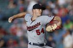 Minnesota Twins starting pitcher Sonny Gray throws against the Cleveland Guardians during the first inning of a baseball game Monday, June 27, 2022, in Cleveland. (AP Photo/Ron Schwane)
