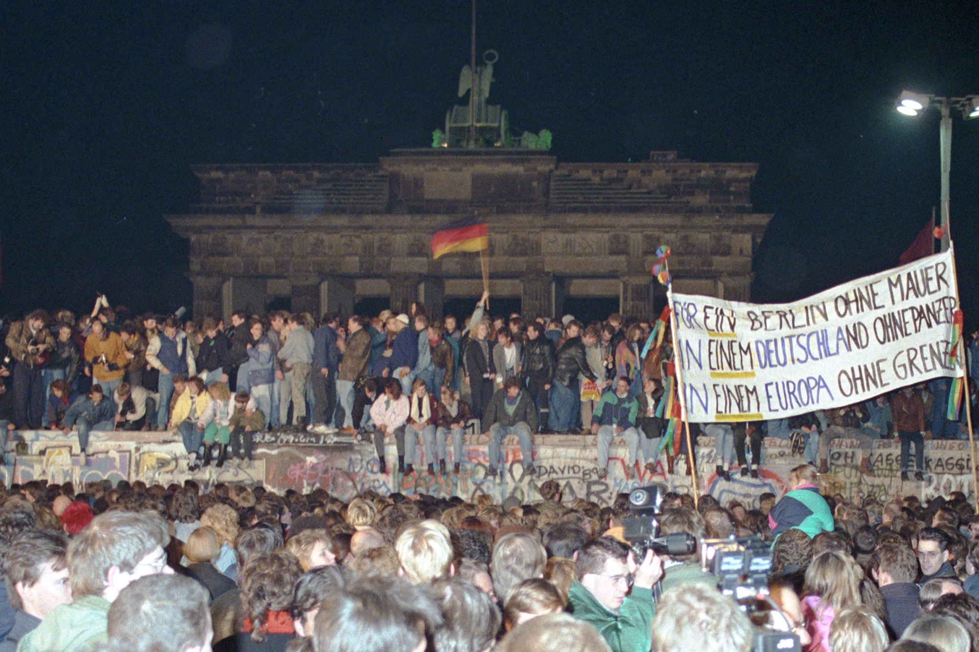 The opening up of the Berlin Wall prompted mass celebration on and around the barrier on Nov. 10, 1989.