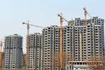 Residential apartment buildings under construction in Qingzhou city, in east China’s Shandong province