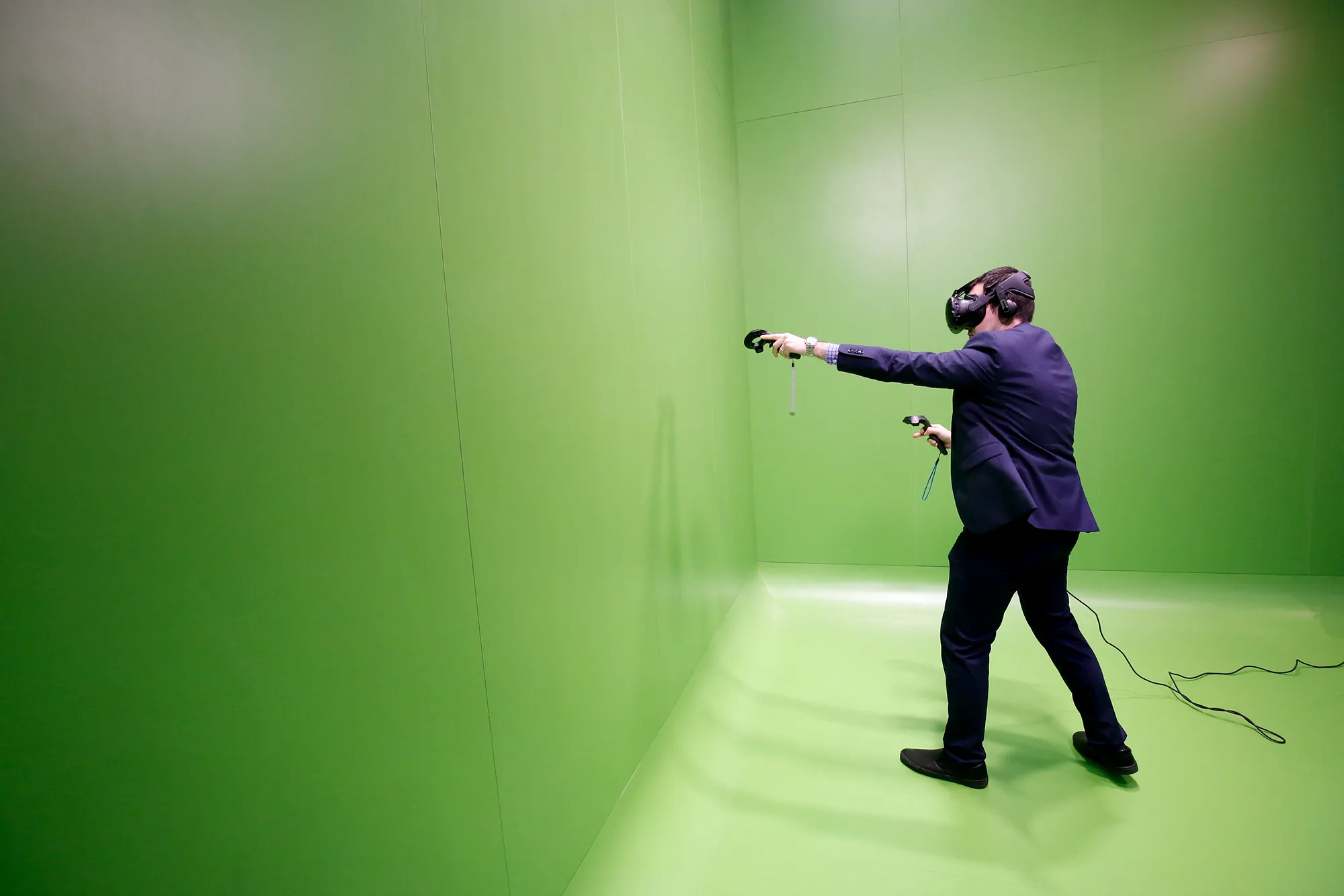 Using the Vive virtual reality headset, manufactured by HTC.
