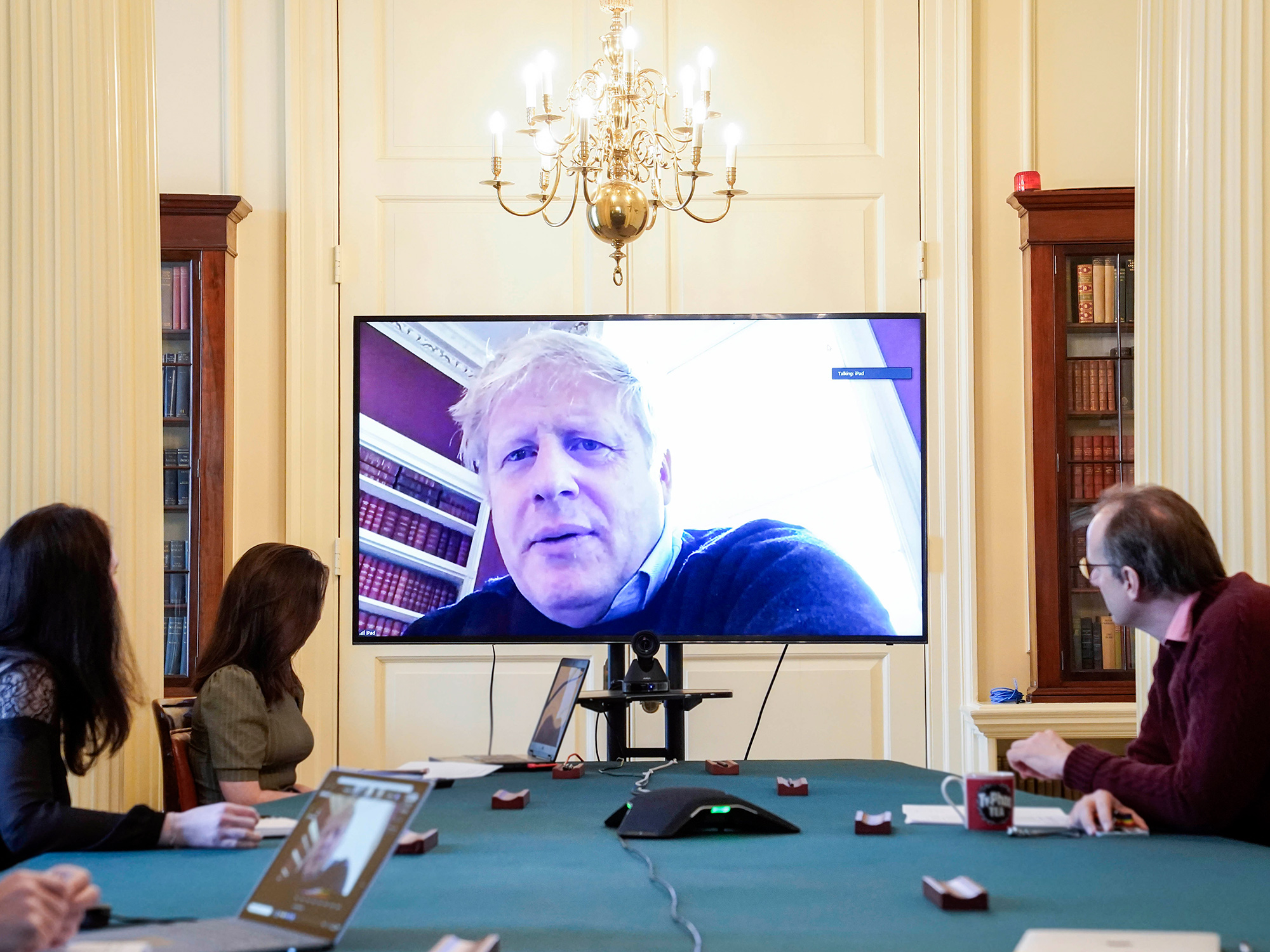 Boris Johnson chairs a Covid-19 response meeting remotely, in London, on March 28.