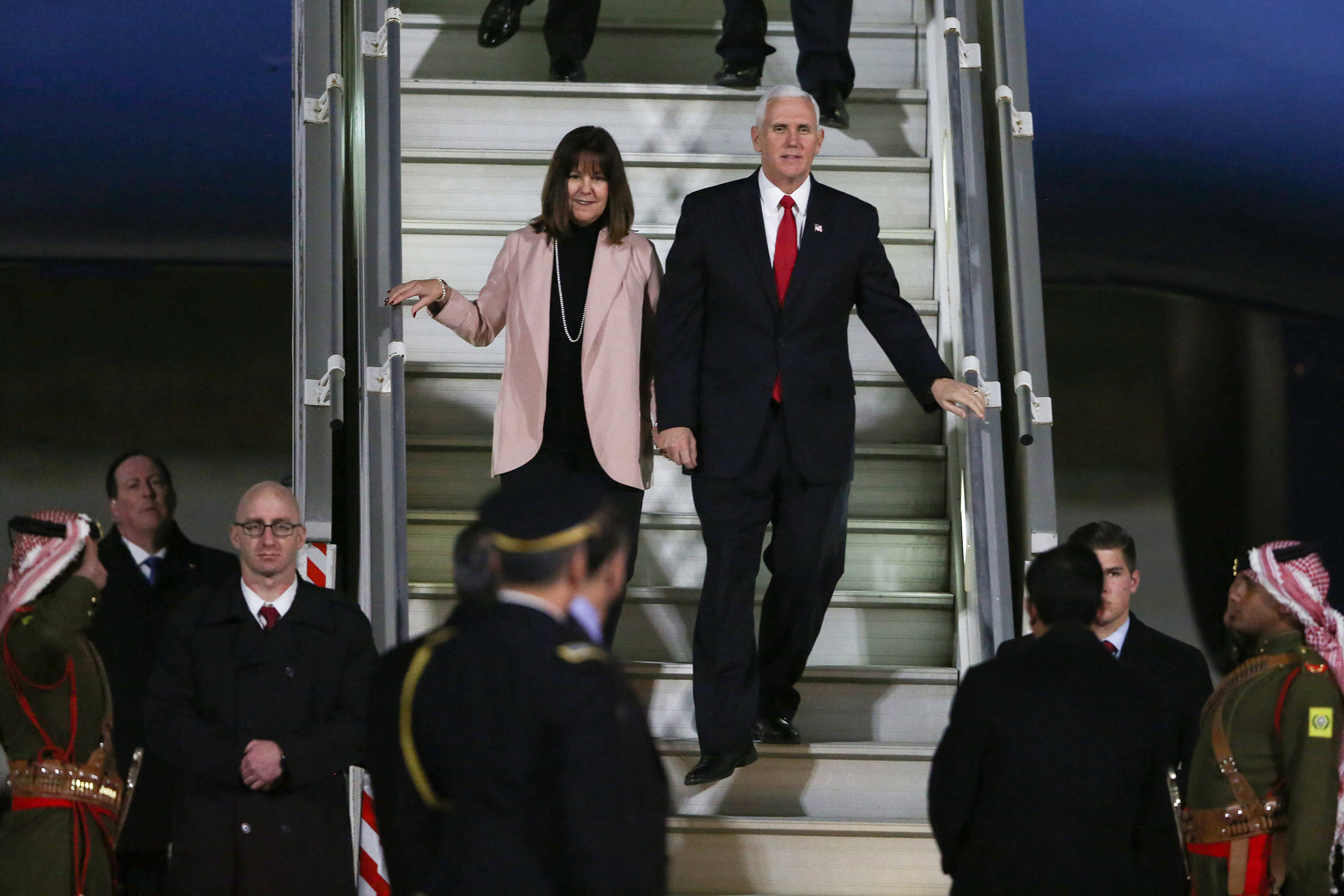 U.S. Vice President Mike Pence and his wife Karen Pence leave Air Force Two upon their arrival in the Jordanian capital Amman, on Jan.&nbsp;20, 2018.