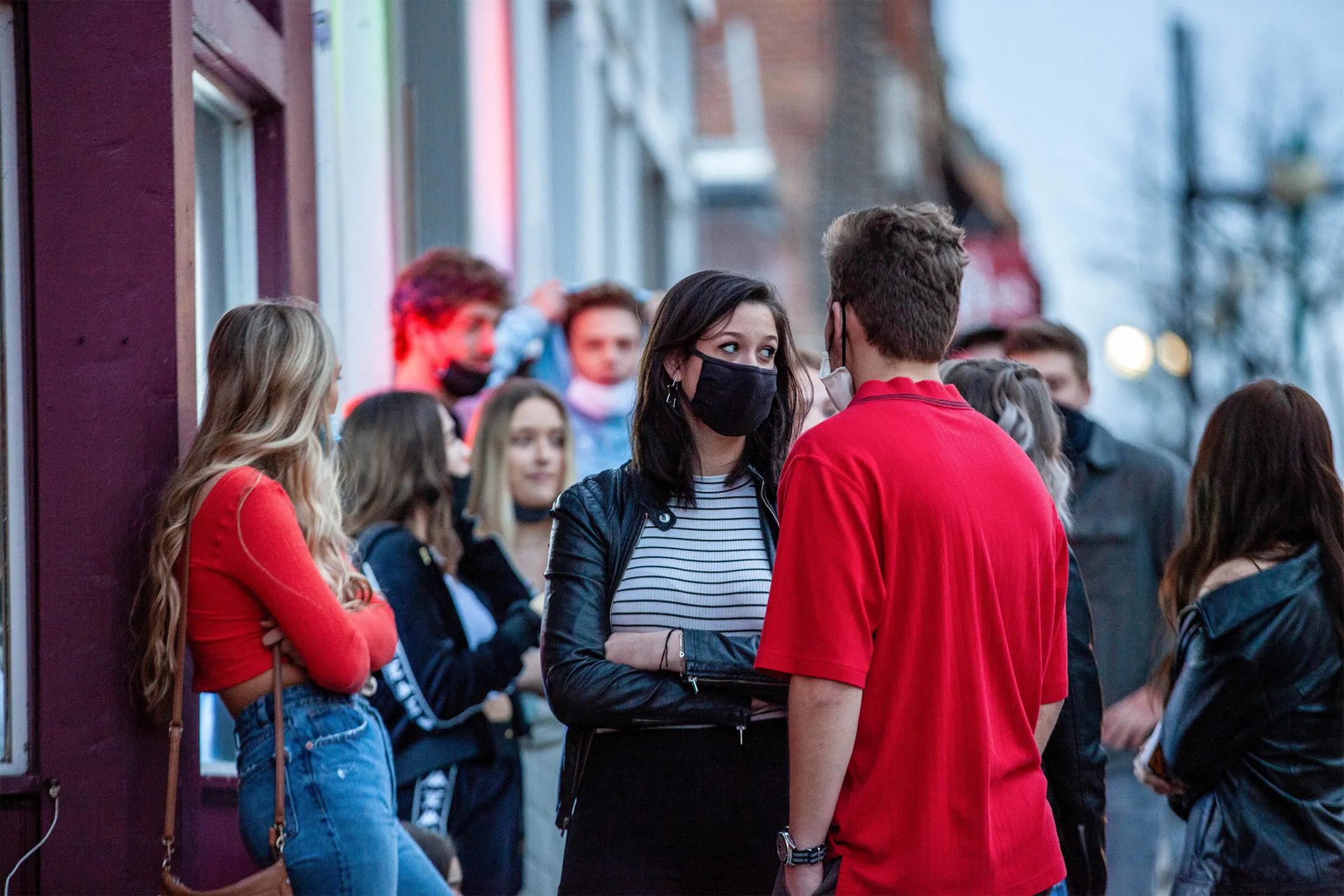 People wait in line to enter a bar in Athens, Ohio, on Feb. 27.