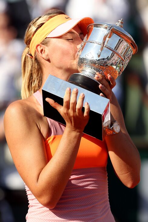 Maria Sharapova celebrates winning the 2014 French Open.