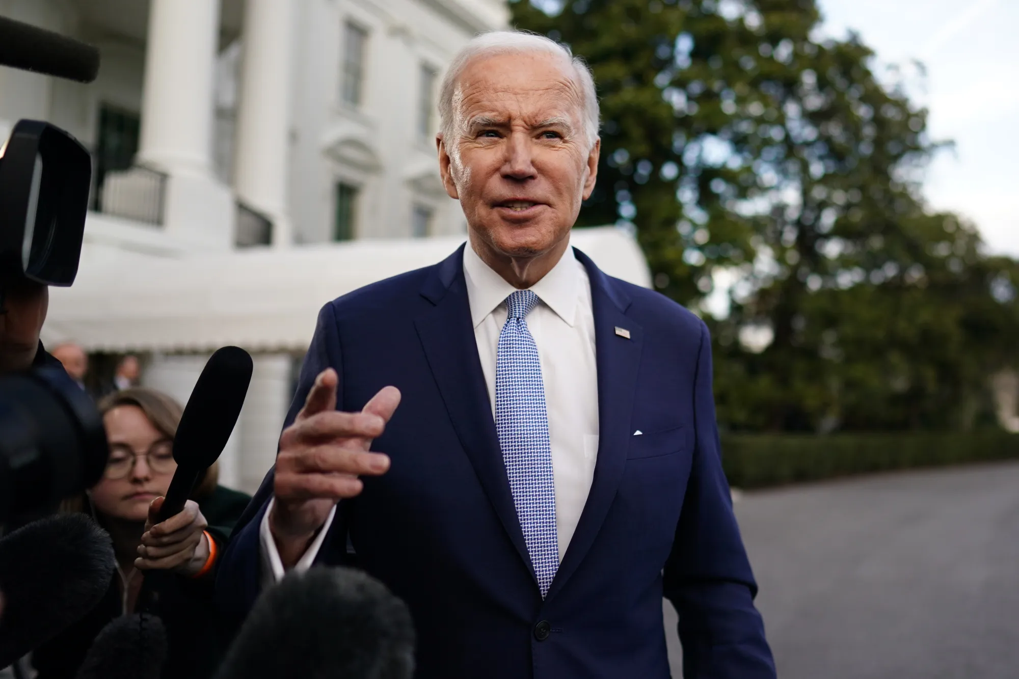 President Joe Biden speaks to members of the media before boarding Marine One on the South Lawn of the White House in Washington, DC, on Feb. 24.