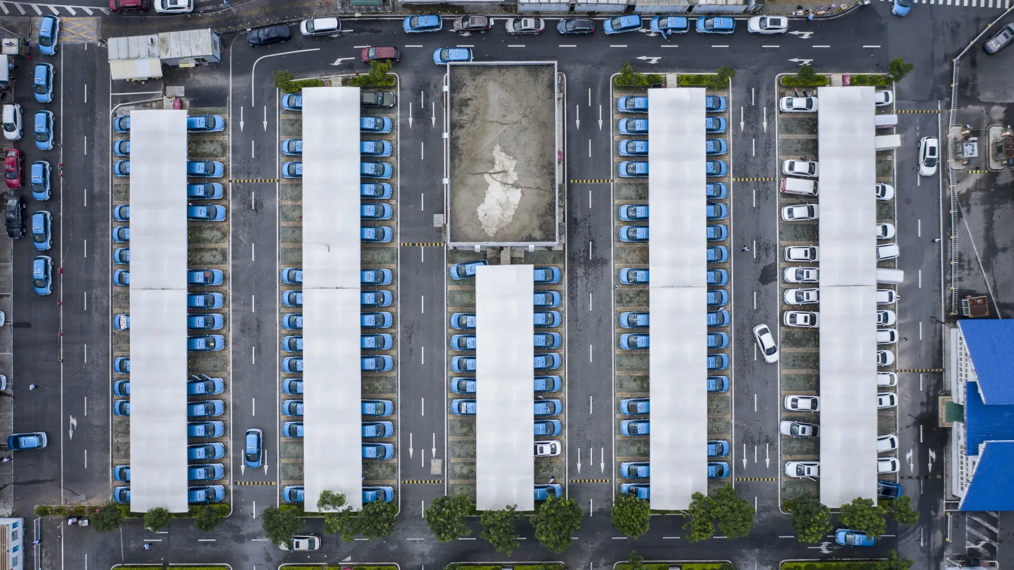 Vehicles at electric charging stations in Shenzhen.